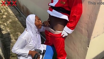 Steamy Christmas Encounter With Santa And A Seductive Hijab-Clad Woman. Subscribe To Red.