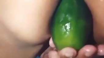 Stepmom Flaunts Her Open Ass By Using A Large Cucumber As A Sex Toy
