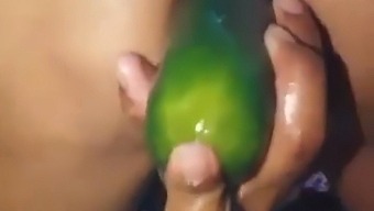Stepmom Flaunts Her Open Ass By Using A Large Cucumber As A Sex Toy